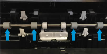 Image: Clean the rollers in the rear of the printer